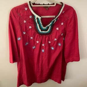 Embroidered tunic.